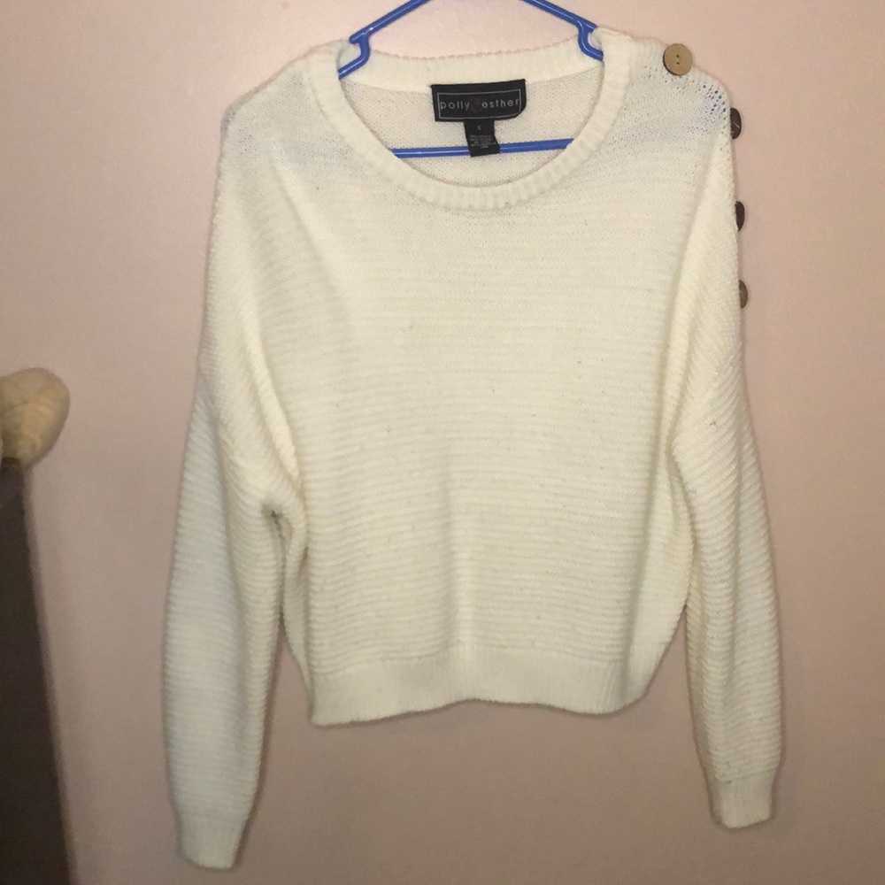 Knit sweater with buttons on the side